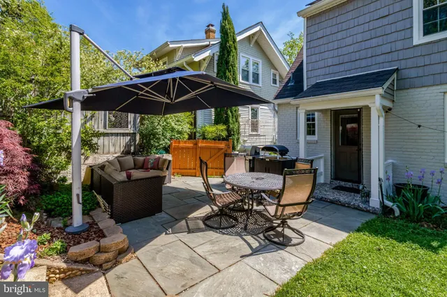 a view of a house with snow in the background