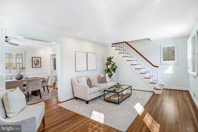 a living room with furniture and window