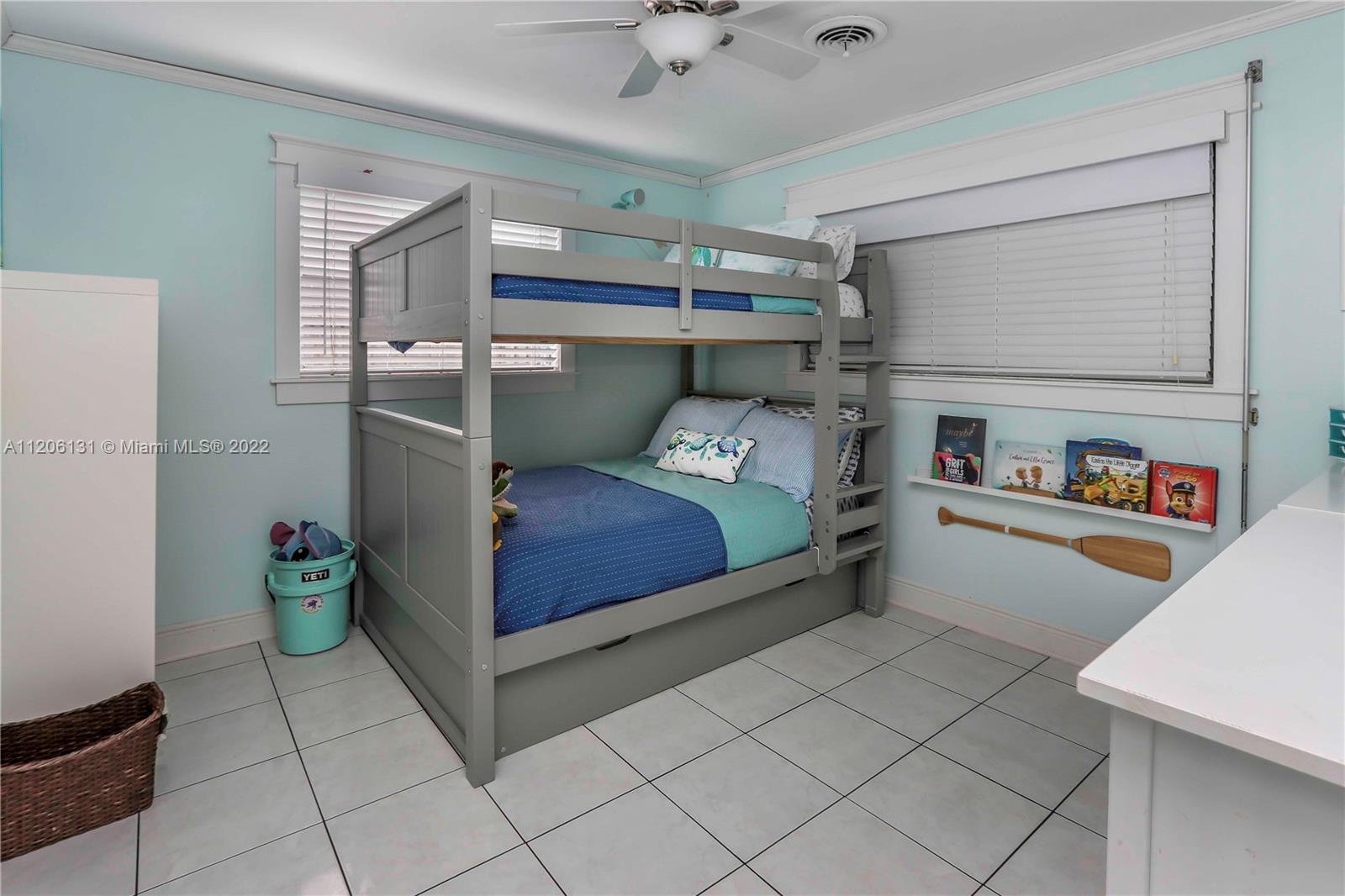 1711 North Park Road Hollywood, FL 33021 - Photo 19 of 29 a bedroom with a bed and a dresser in it