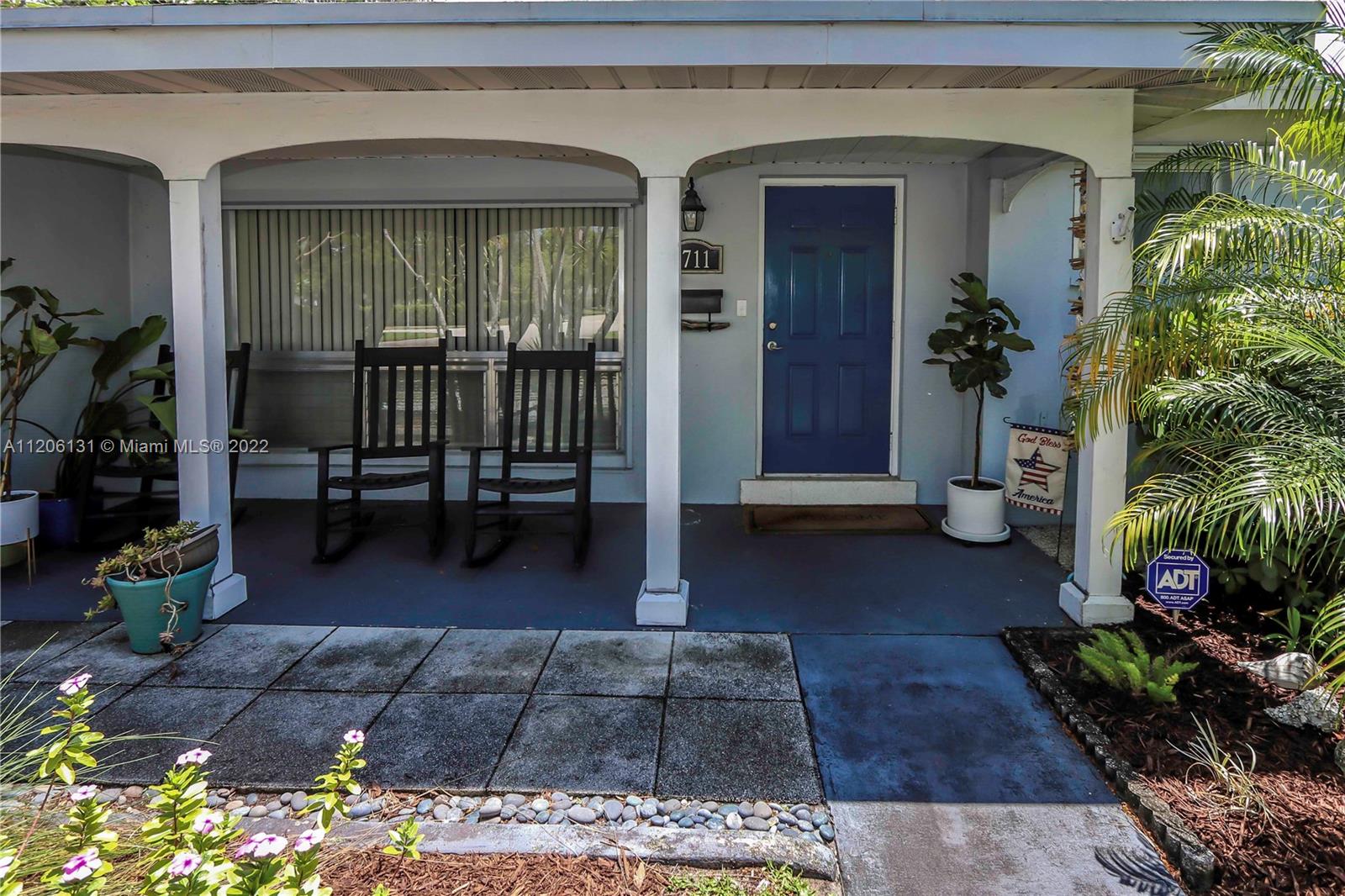 1711 North Park Road Hollywood, FL 33021 - Photo 2 of 29 a view of livingroom with furniture and floor to ceiling window