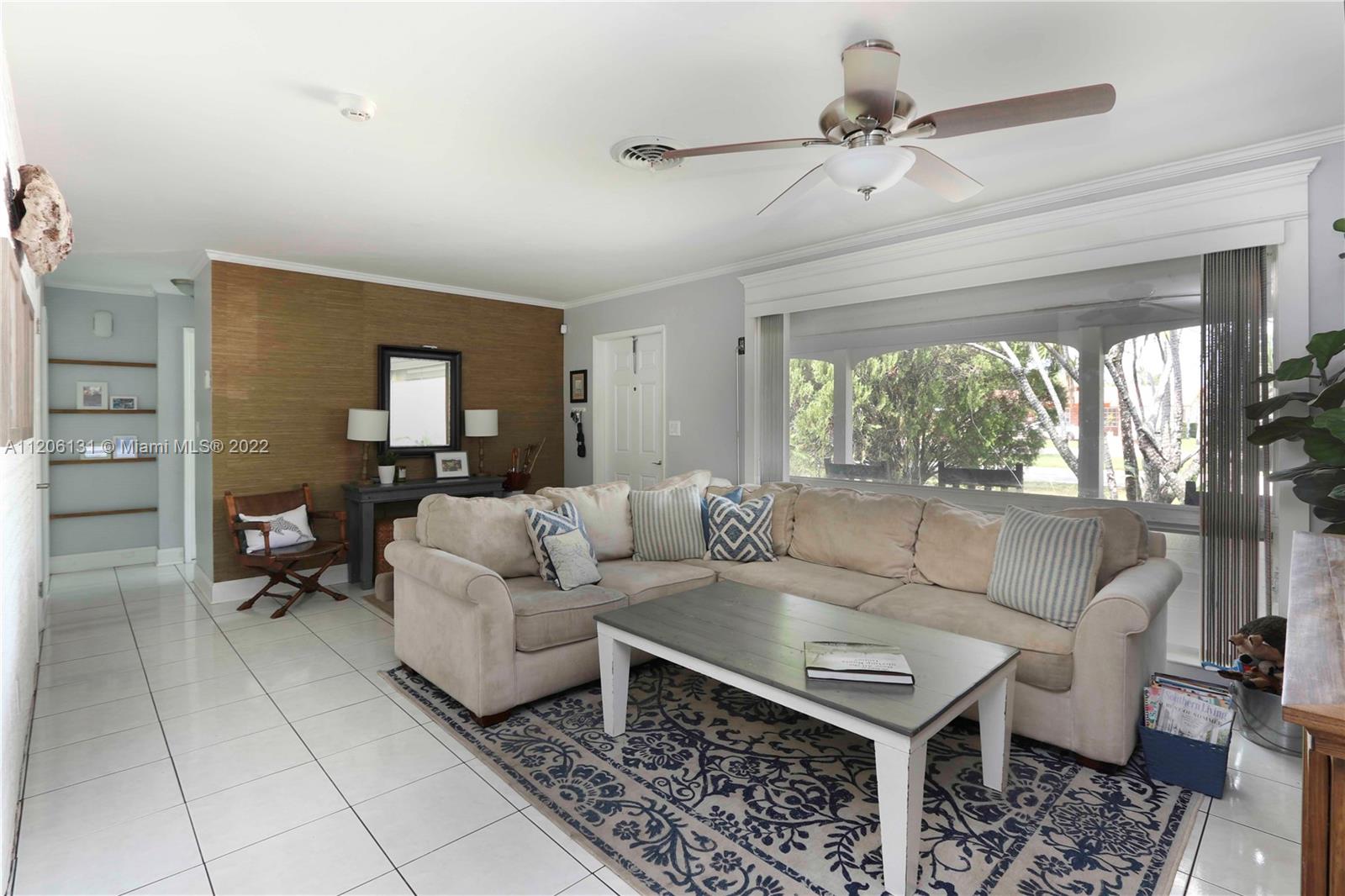 1711 North Park Road Hollywood, FL 33021 - Photo 3 of 29 a living room with furniture and a large window