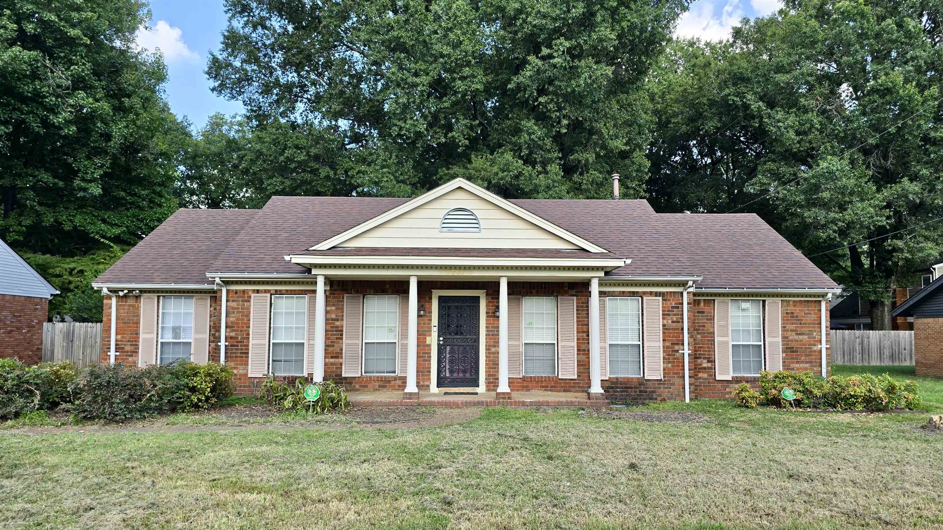 3068 South Mendenhall Road Memphis, TN 38115 - Photo 1 of 26 View of front of house featuring roof with shingles and brick siding