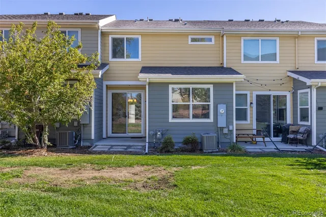 a brick house with a large windows
