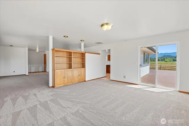 a view of a livingroom with an empty room