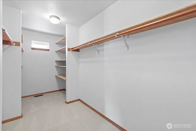 a view of a kitchen with sink and washer