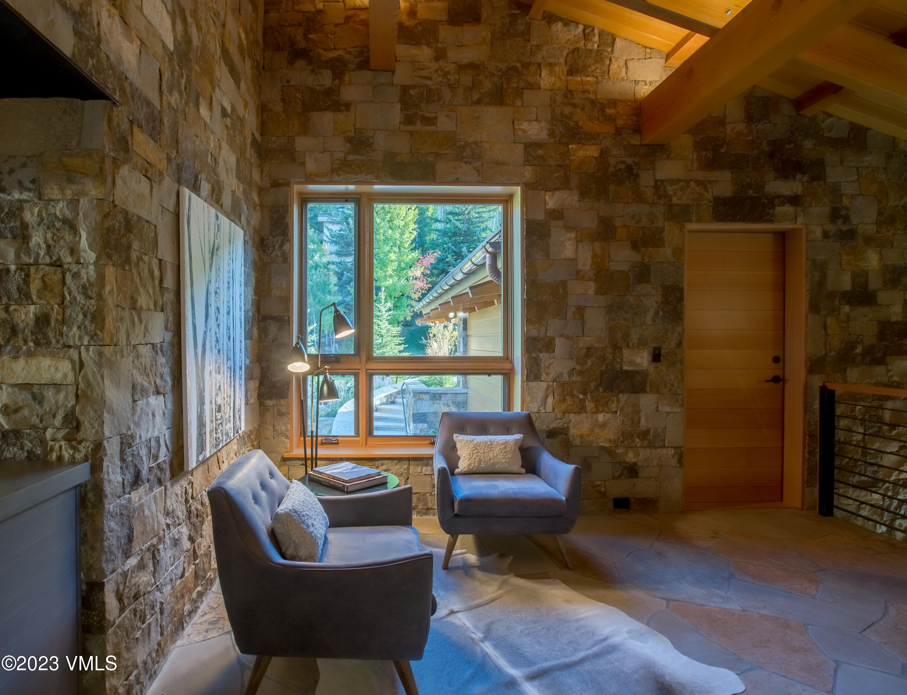 645 West Forest Road Vail, CO 81657 - Photo 21 of 48 a outdoor living space with patio furniture and a potted plant