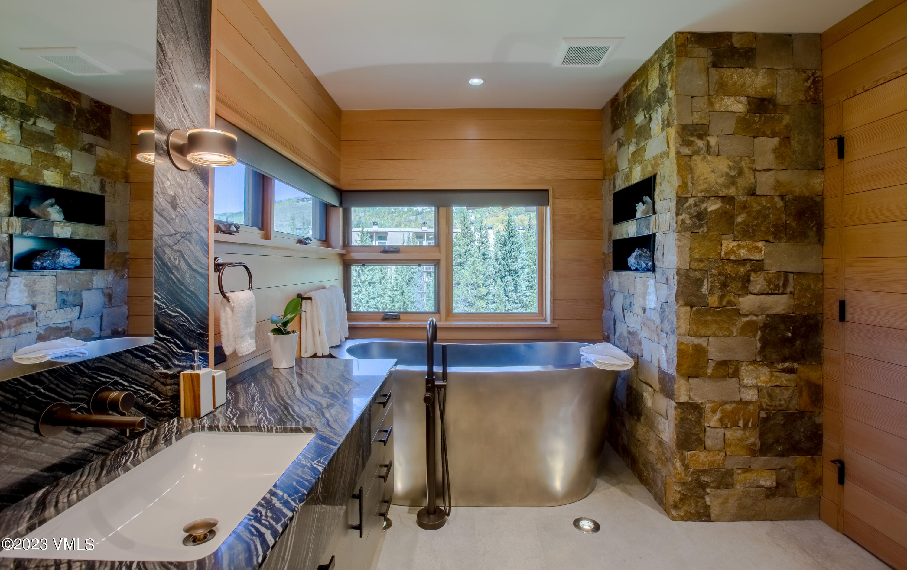 645 West Forest Road Vail, CO 81657 - Photo 29 of 48 a kitchen with a sink and a stove top oven