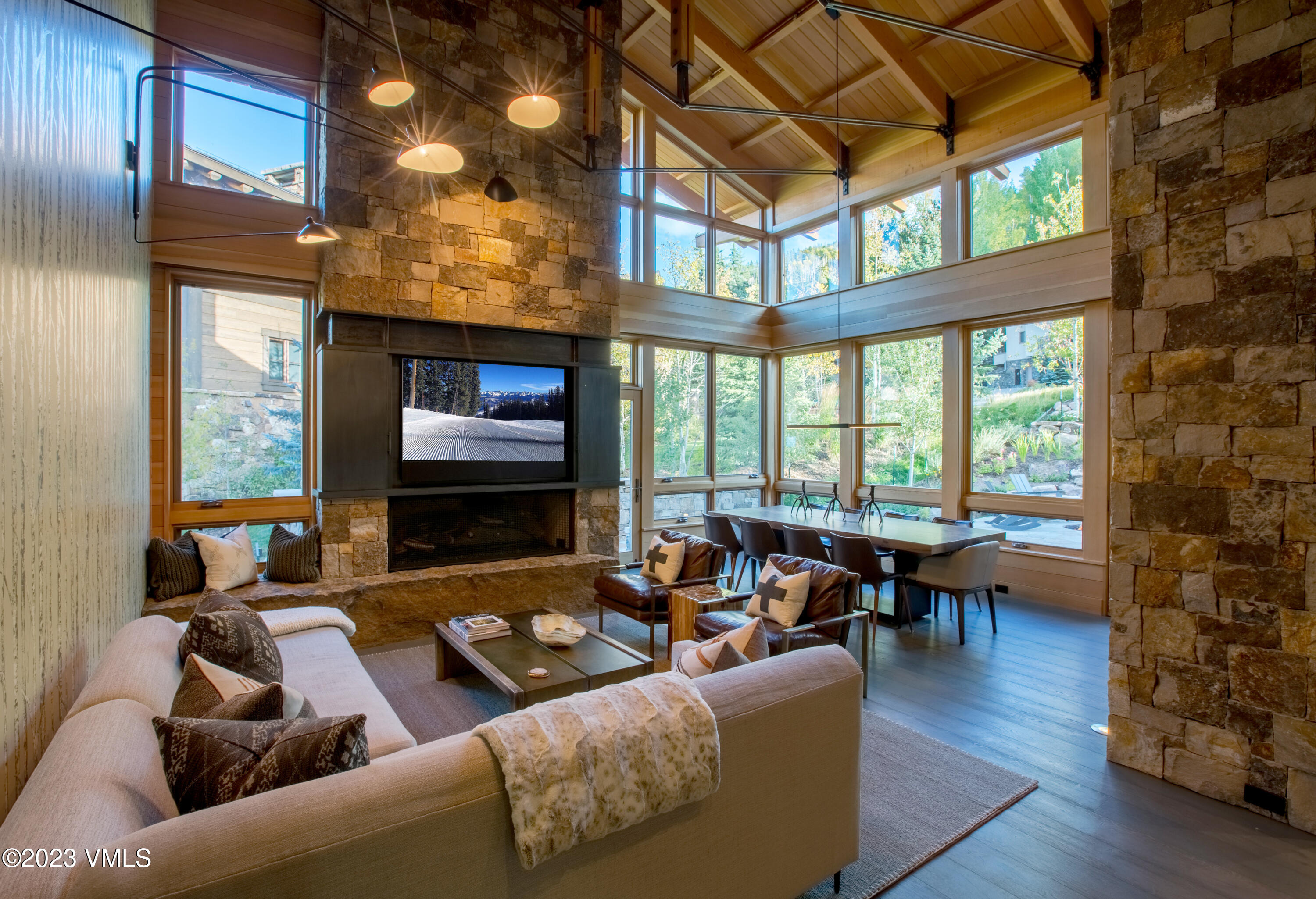 645 West Forest Road Vail, CO 81657 - Photo 3 of 48 a living room with furniture and a flat screen tv