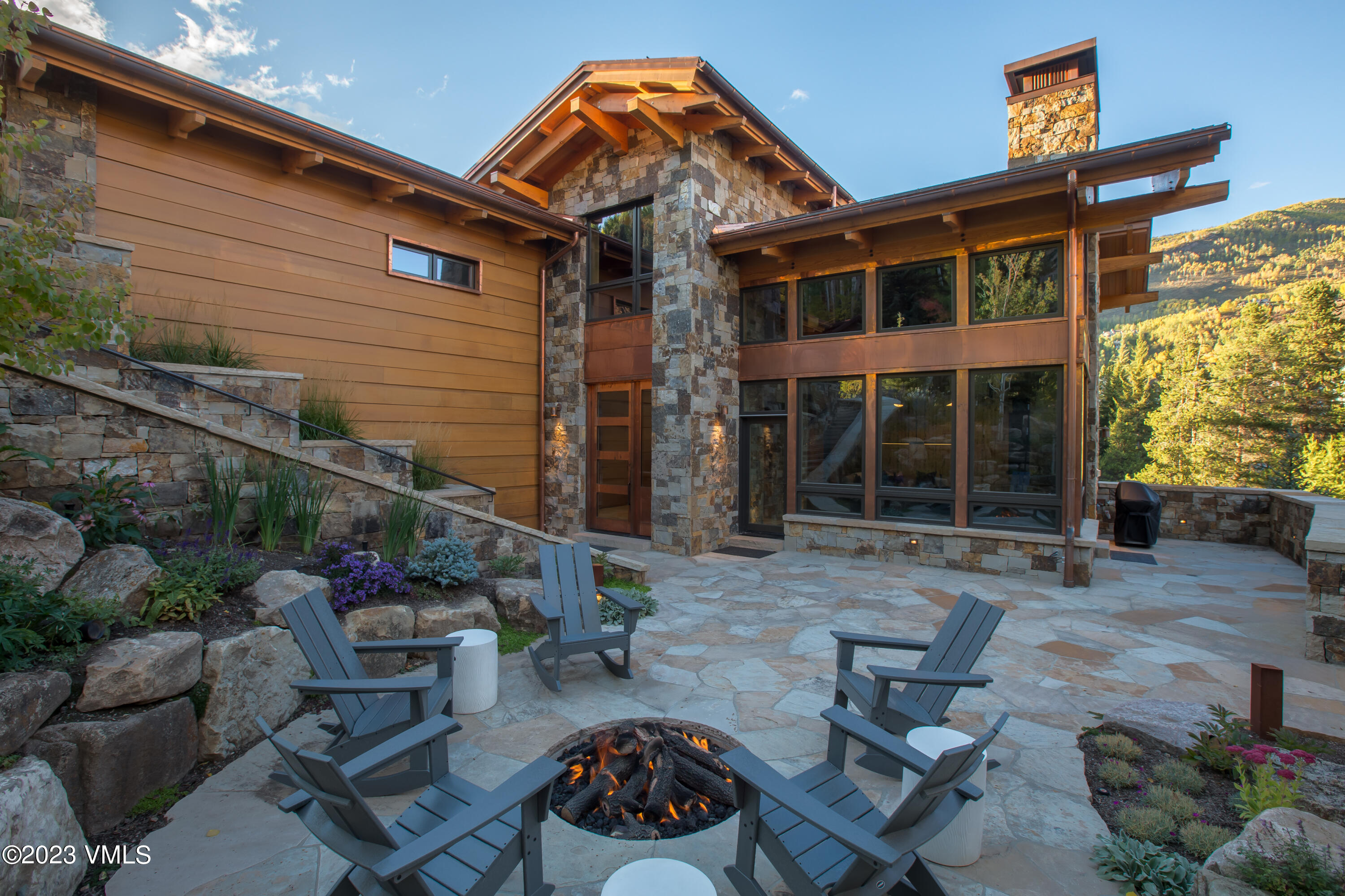 645 West Forest Road Vail, CO 81657 - Photo 44 of 48 a backyard of a house with outdoor seating