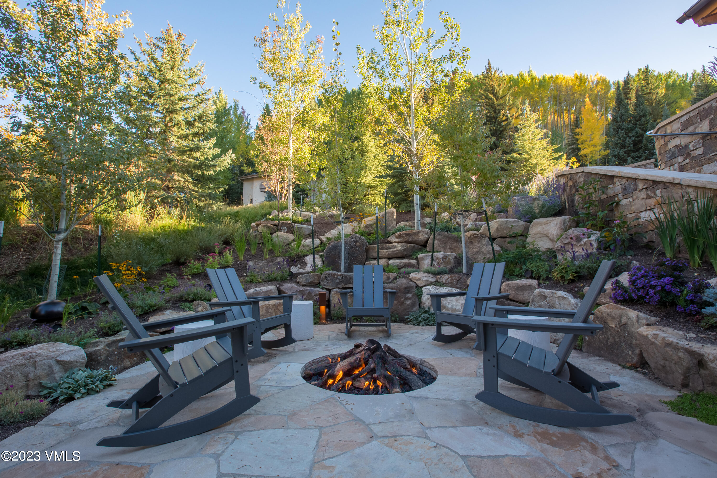 645 West Forest Road Vail, CO 81657 - Photo 45 of 48 a outdoor space with lots of furniture and garden