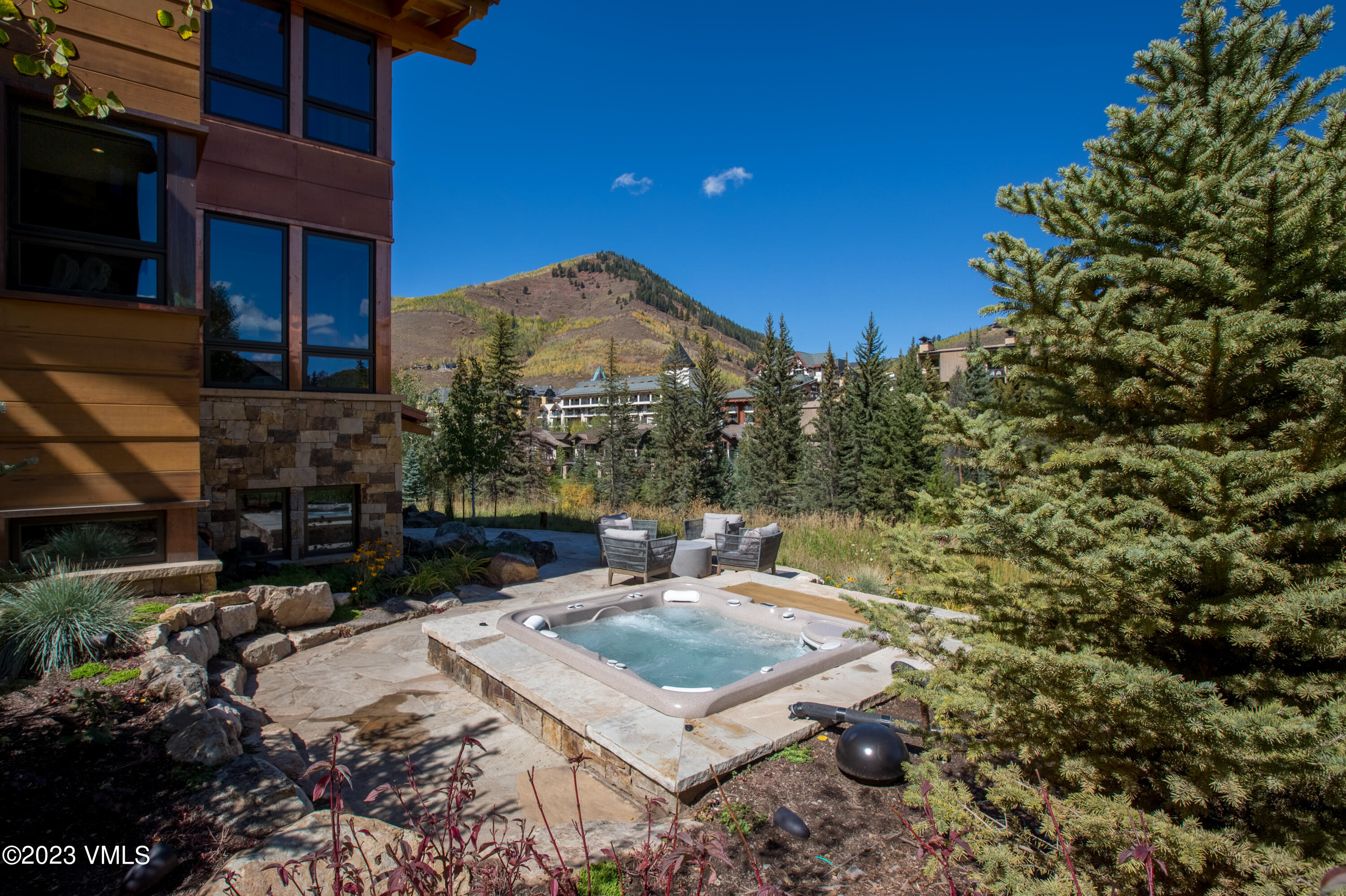 645 West Forest Road Vail, CO 81657 - Photo 46 of 48 a view of a backyard with sitting area
