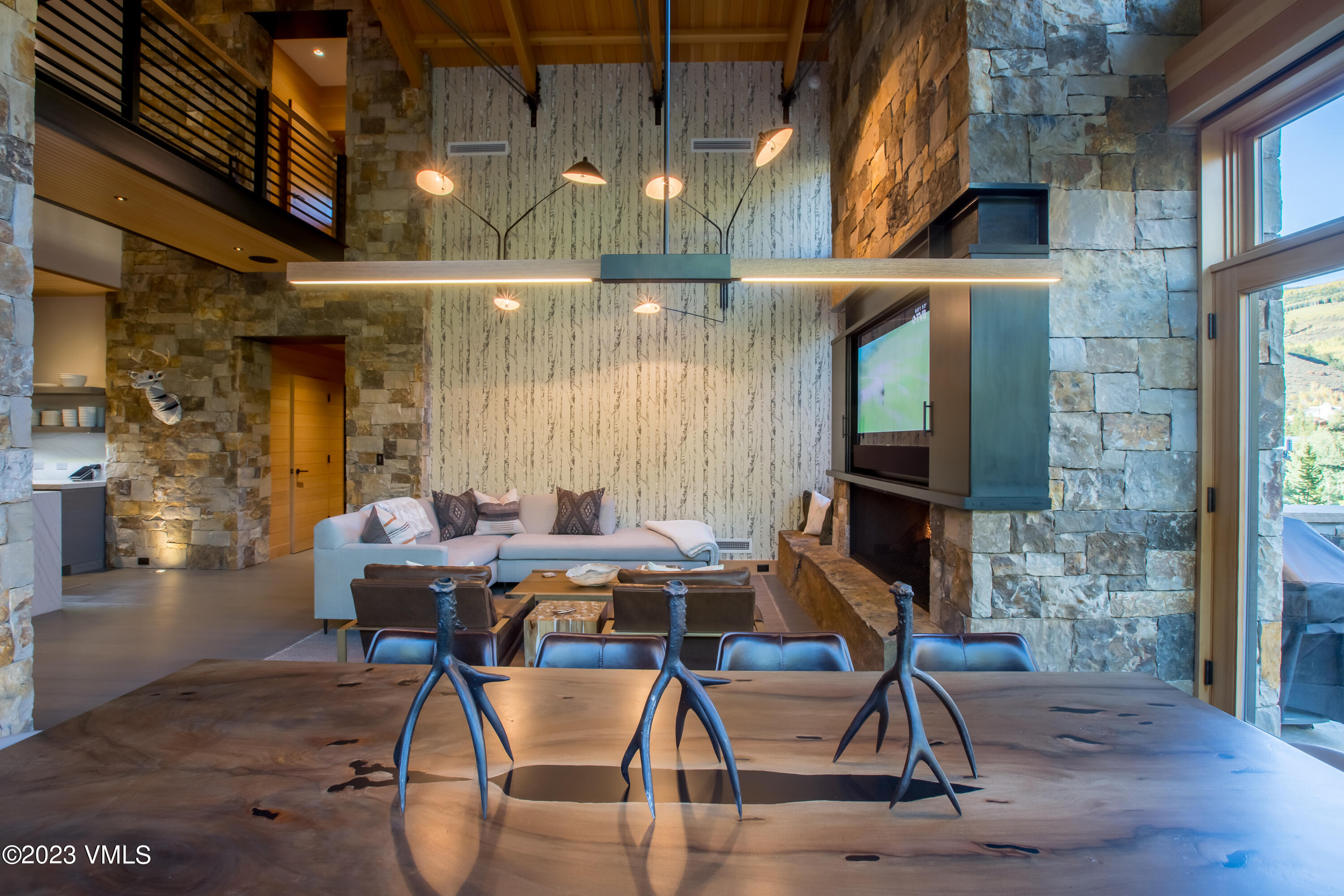 645 West Forest Road Vail, CO 81657 - Photo 5 of 48 a building outdoor space with patio furniture and potted plants