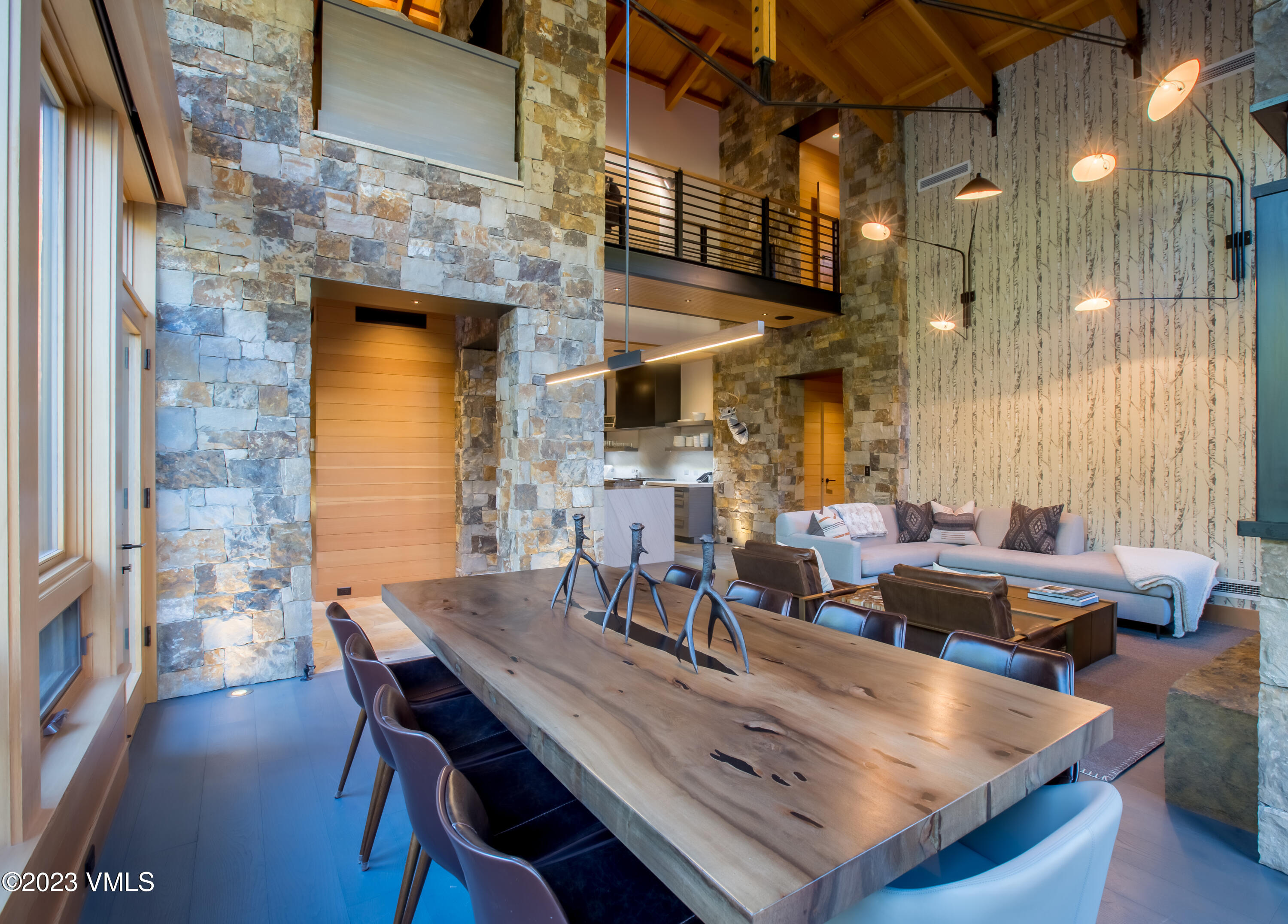 645 West Forest Road Vail, CO 81657 - Photo 7 of 48 a view of a dining room with furniture window and wooden floor