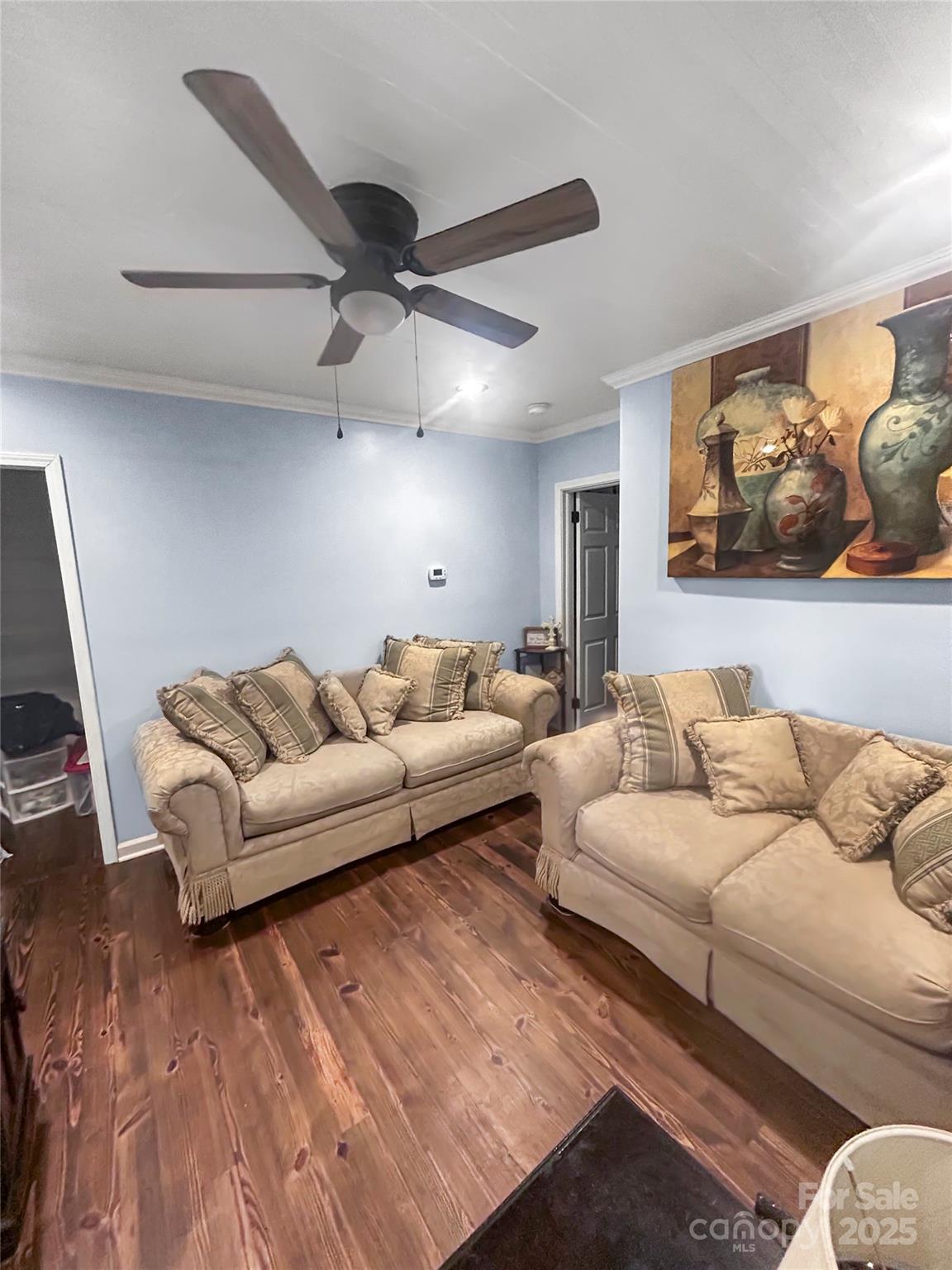 754 South 5th Street Albemarle, NC 28001 - Photo 3 of 13 a living room with furniture and a wooden floor