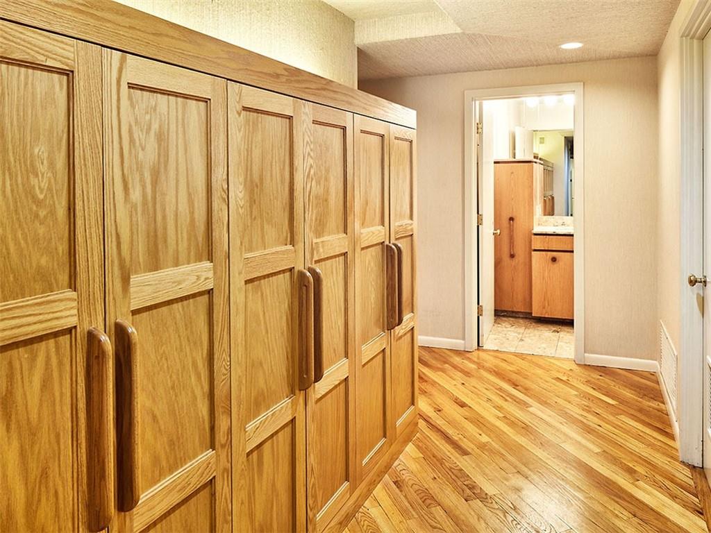 5000 5th, Unit 101 Pittsburgh, PA 15232 - Photo 17 of 38 Built-in storage along the hallway to the bedrooms and bathrooms.