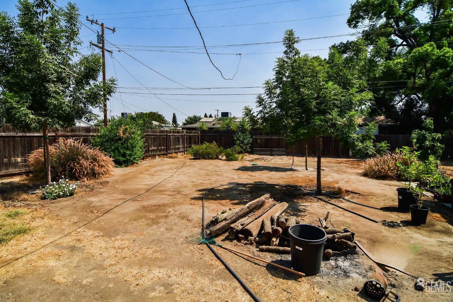 Undisclosed Address Visalia, CA 93291 - Photo 5 of 14 a view of a backyard