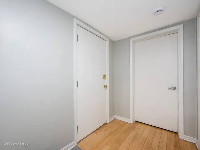 a view of small space with wooden floor