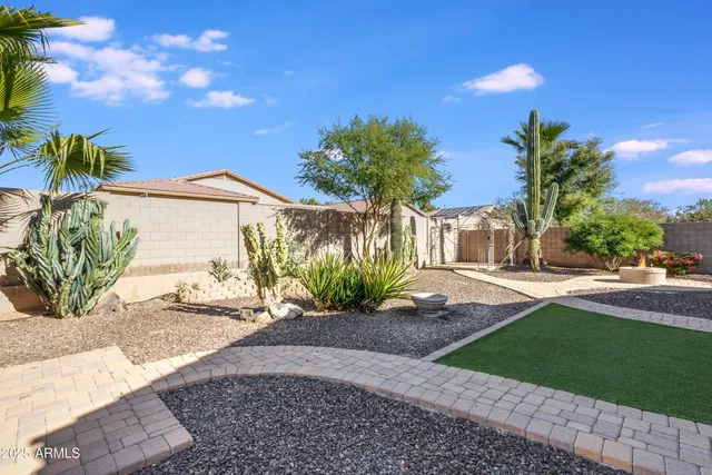 a view of a backyard of the house