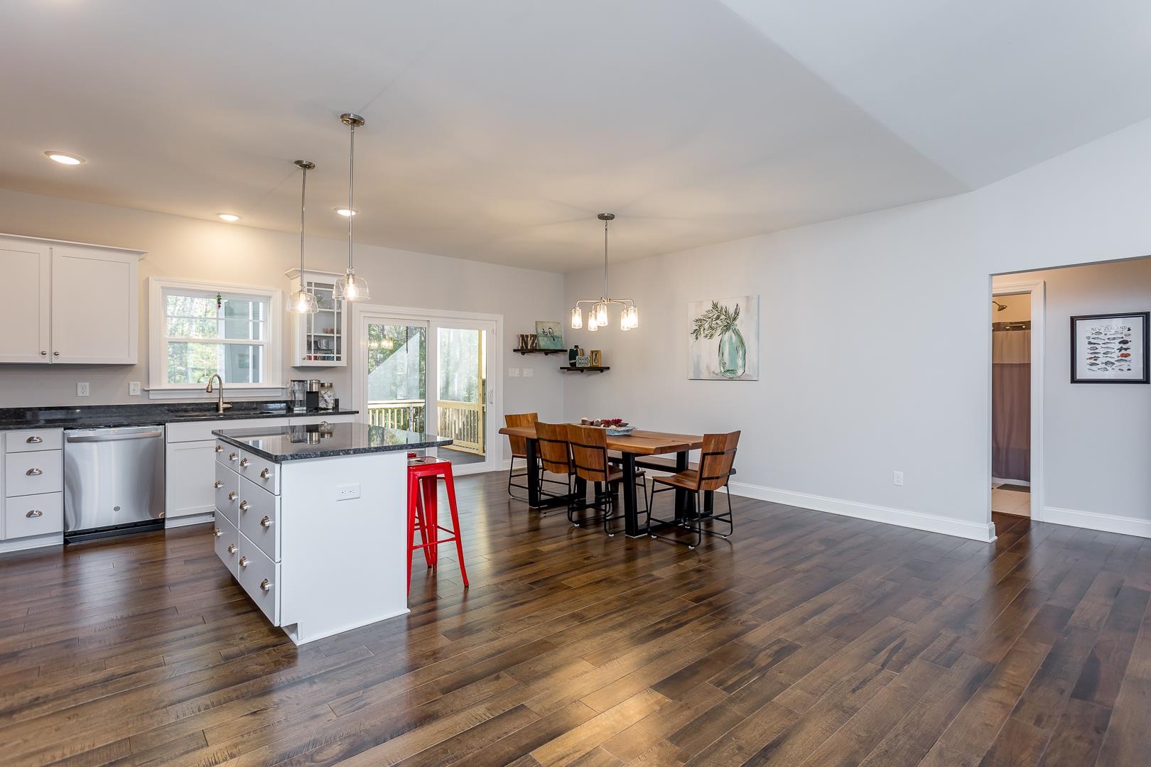 3768 Boundary Run Road Gum Spring, VA 23065 - Photo 11 of 46 an open kitchen with wooden floor and stainless steel appliances