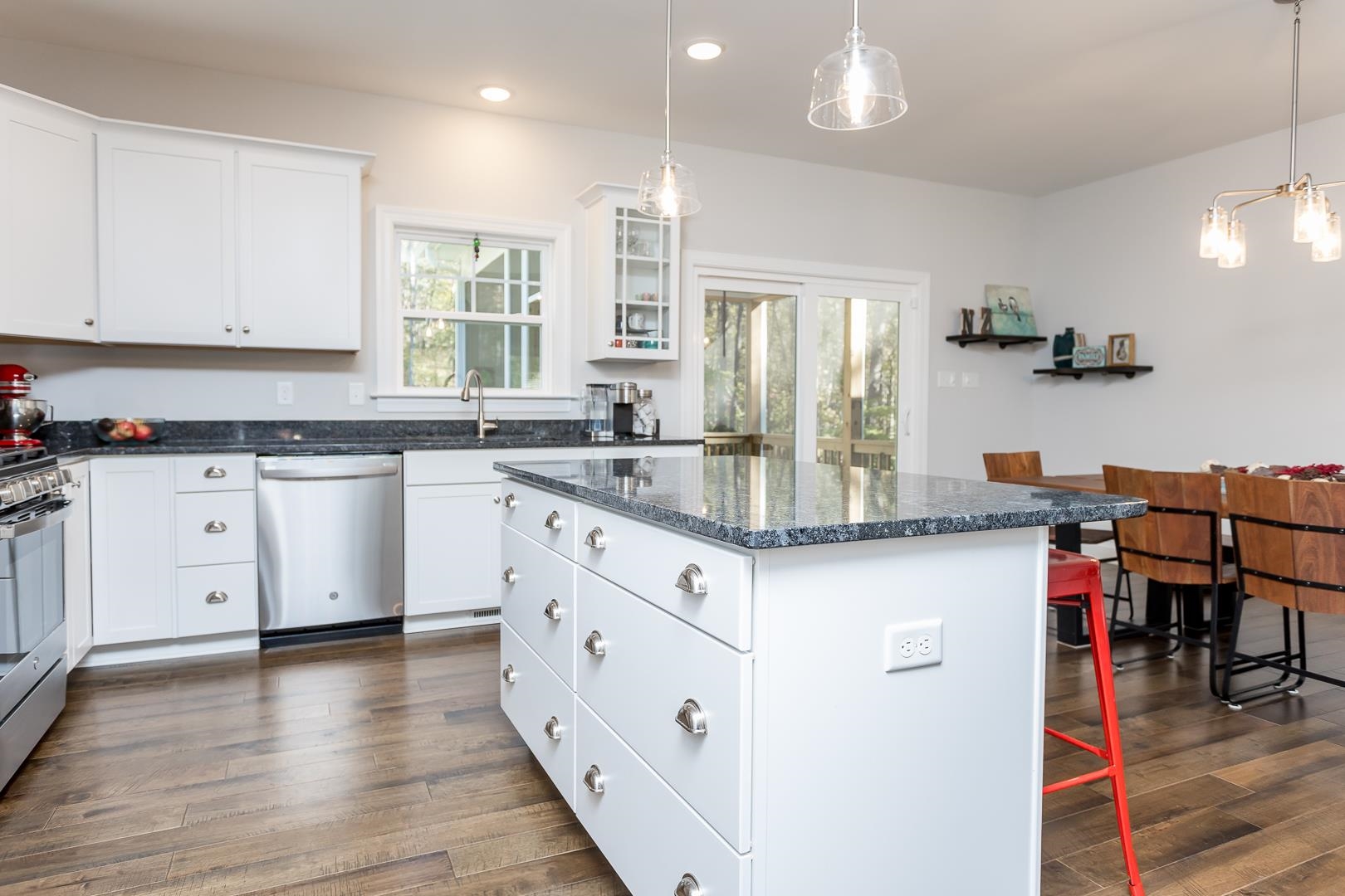 3768 Boundary Run Road Gum Spring, VA 23065 - Photo 14 of 46 a kitchen with stainless steel appliances granite countertop a sink cabinets and wooden floor