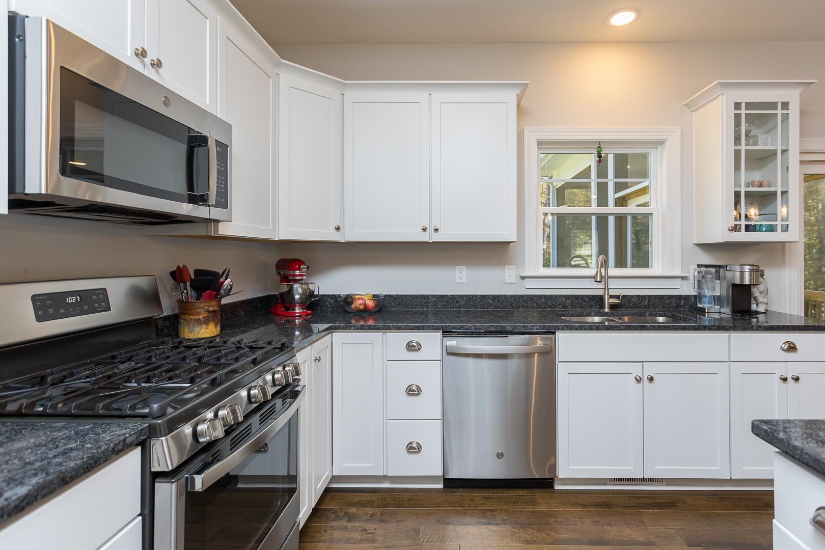 3768 Boundary Run Road Gum Spring, VA 23065 - Photo 16 of 46 a kitchen with stainless steel appliances granite countertop a sink stove and cabinets