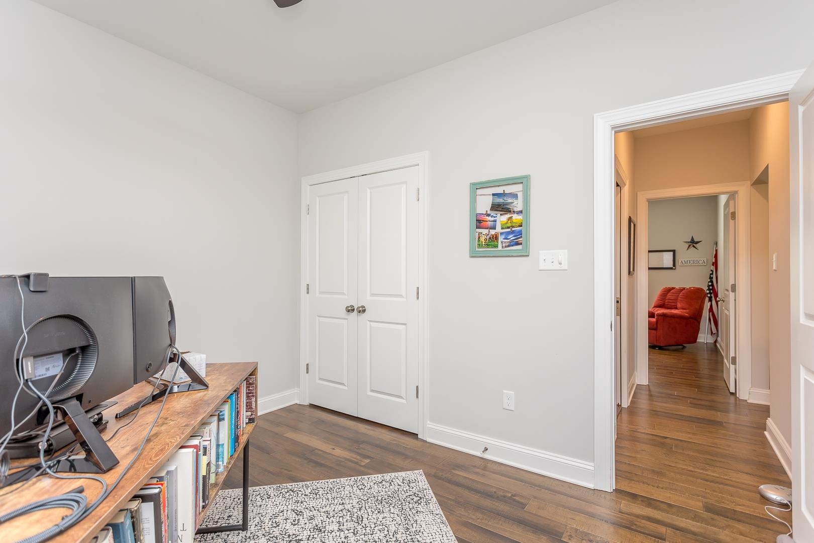 3768 Boundary Run Road Gum Spring, VA 23065 - Photo 19 of 46 a view of a hallway with wooden floor and a workspace