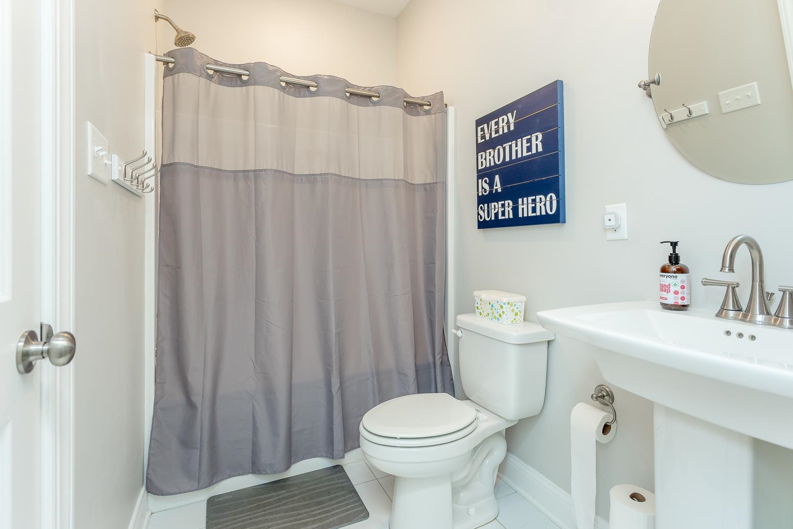3768 Boundary Run Road Gum Spring, VA 23065 - Photo 20 of 46 a bathroom with a sink a toilet and shower curtain