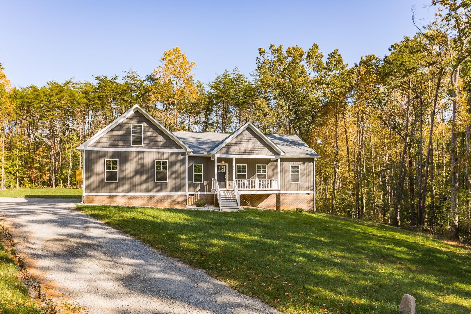 3768 Boundary Run Road Gum Spring, VA 23065 - Photo 2 of 46 a front view of a house with a yard and trees
