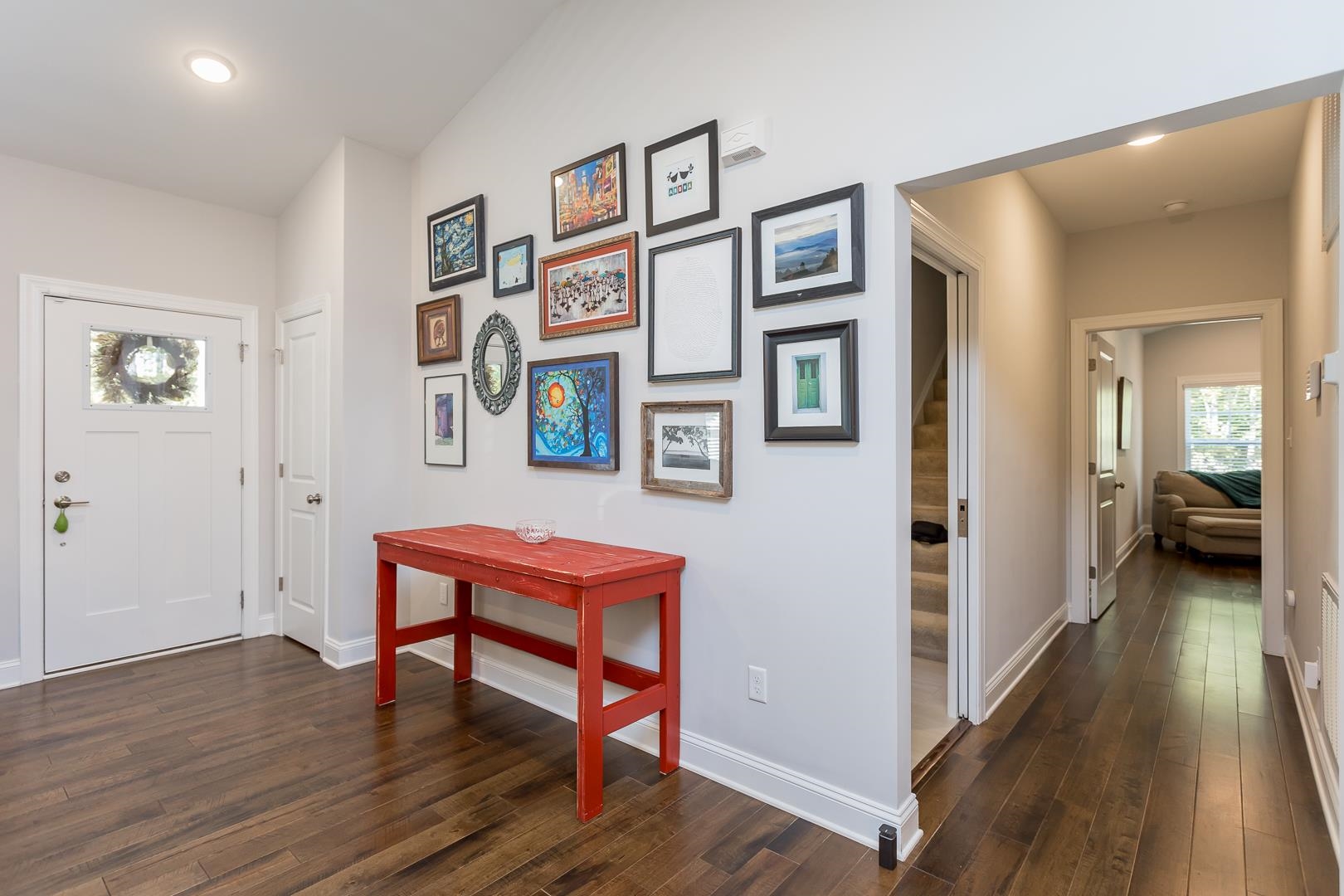 3768 Boundary Run Road Gum Spring, VA 23065 - Photo 28 of 46 a hallway with furniture and wooden floor