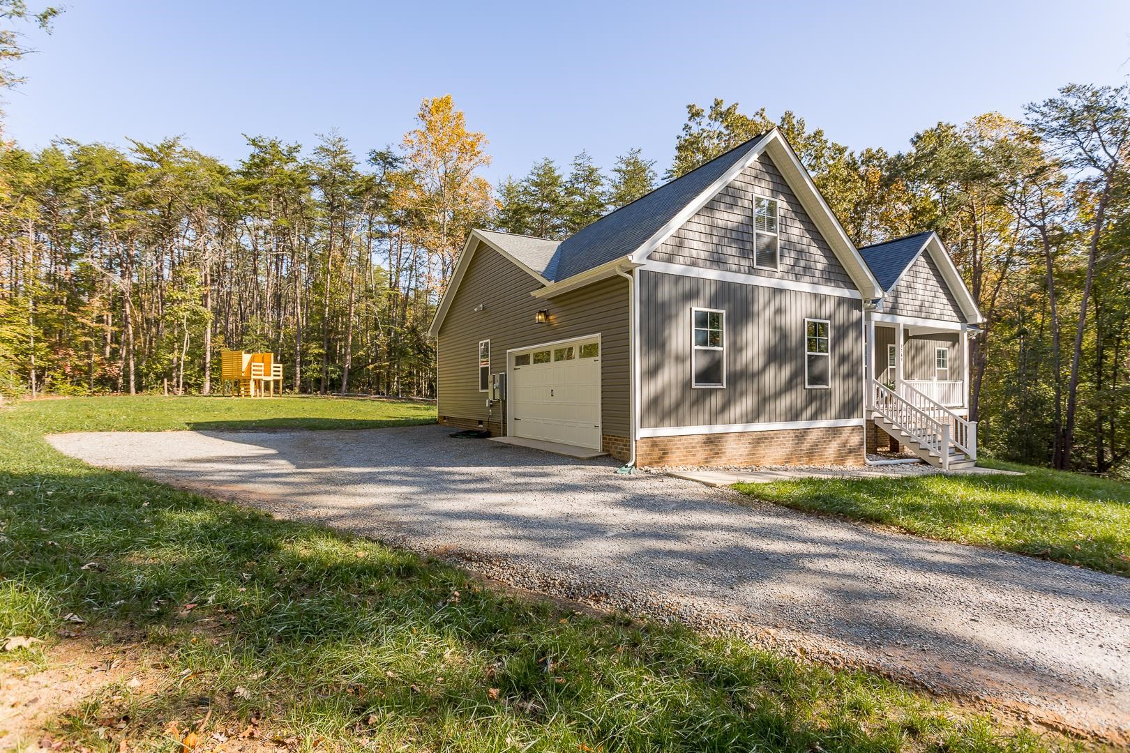 3768 Boundary Run Road Gum Spring, VA 23065 - Photo 3 of 46 a view of a house next to a yard with big trees