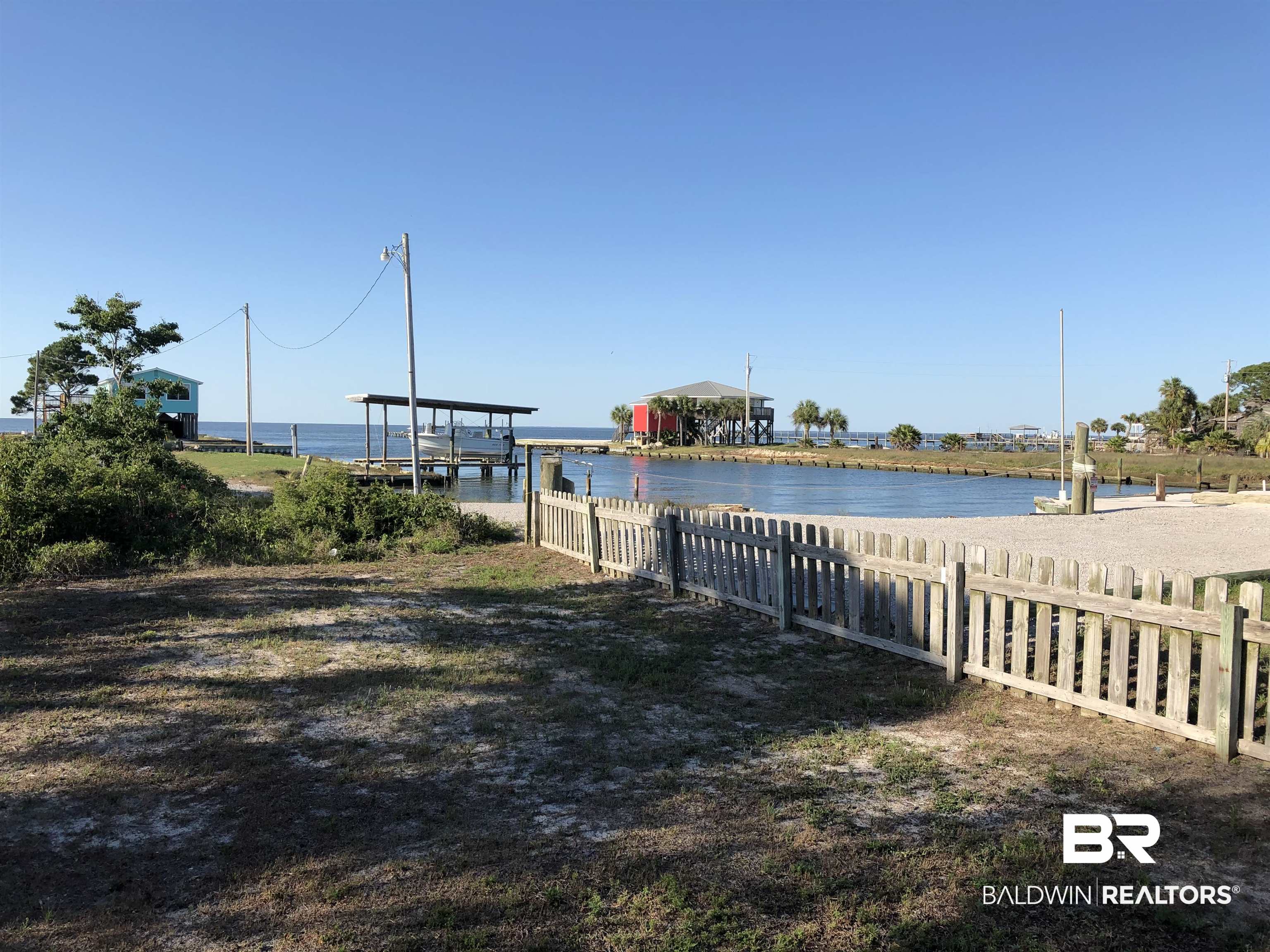 2412 Choctaw Road Gulf Shores, AL 36542 - Photo 13 of 16 Dock featuring a water view