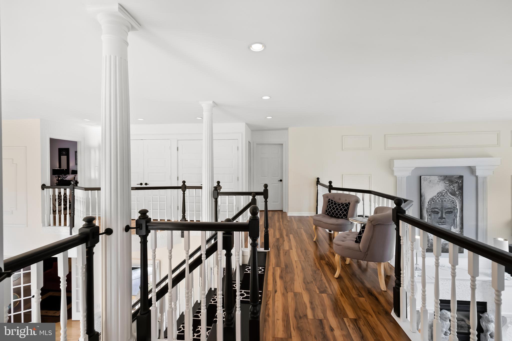 33 South Elmwood Road Marlton, NJ 08053 - Photo 43 of 98 a view of a hallway with wooden floor and staircase