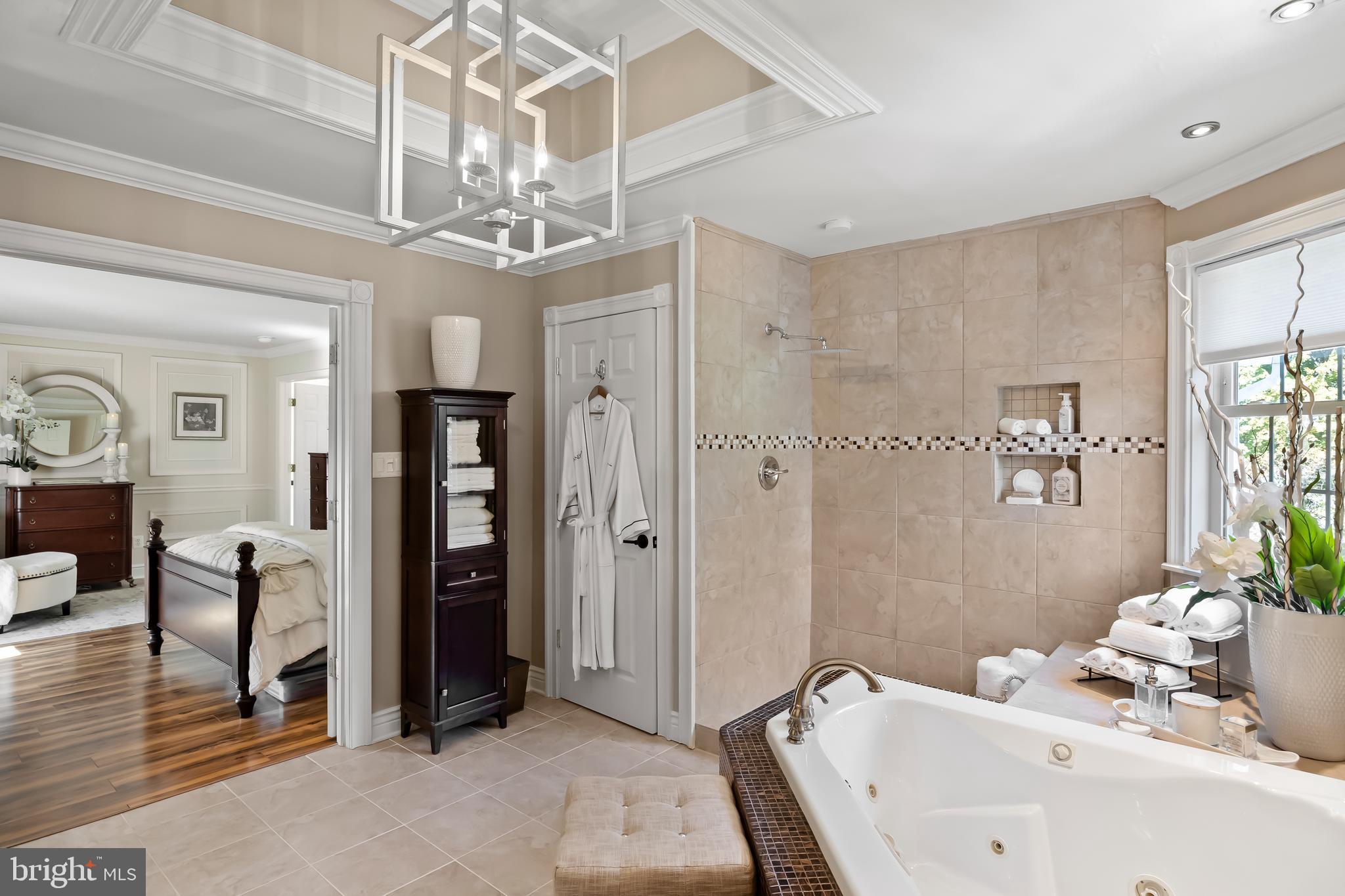 33 South Elmwood Road Marlton, NJ 08053 - Photo 47 of 98 a spacious bathroom with a sink a chandelier and a shower