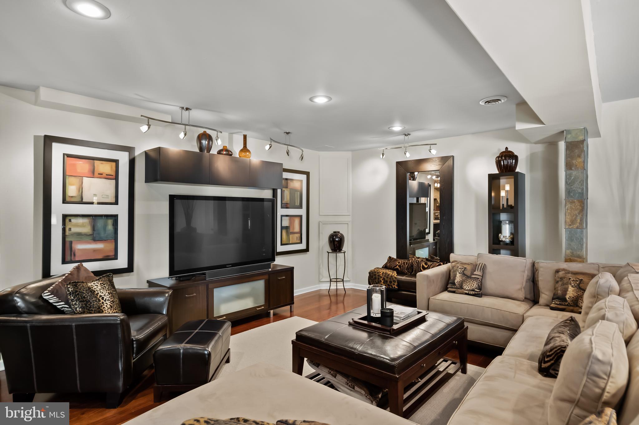 33 South Elmwood Road Marlton, NJ 08053 - Photo 64 of 98 a living room with furniture and a flat screen tv