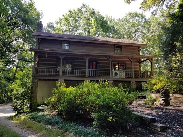265 Bolingview Road Juliette, GA 31046 - Photo 1 of 21 a view of a house with a balcony