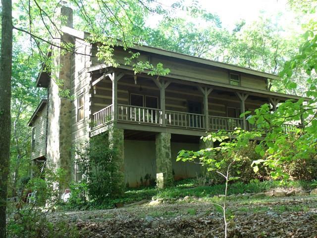 265 Bolingview Road Juliette, GA 31046 - Photo 2 of 21 a front view of a house with a garden