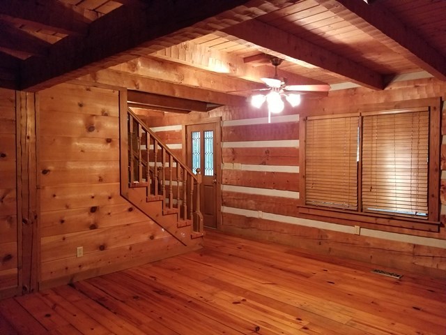 265 Bolingview Road Juliette, GA 31046 - Photo 3 of 21 a view of a porch with wooden floor and stairs