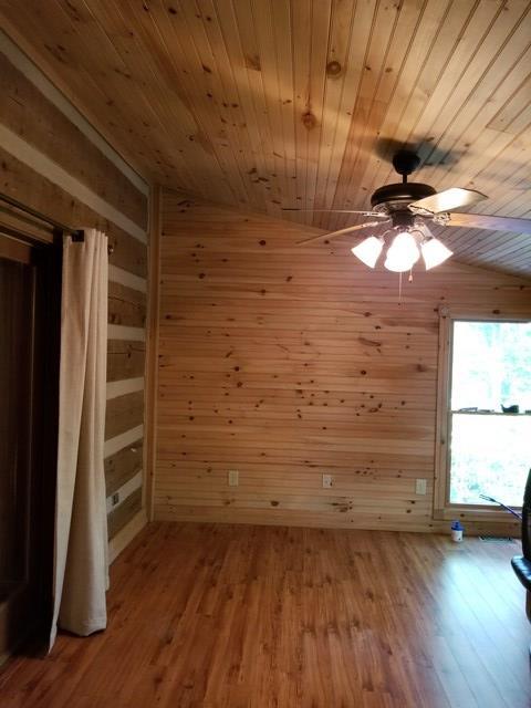 265 Bolingview Road Juliette, GA 31046 - Photo 8 of 21 a view of an empty room with a window and wooden floor