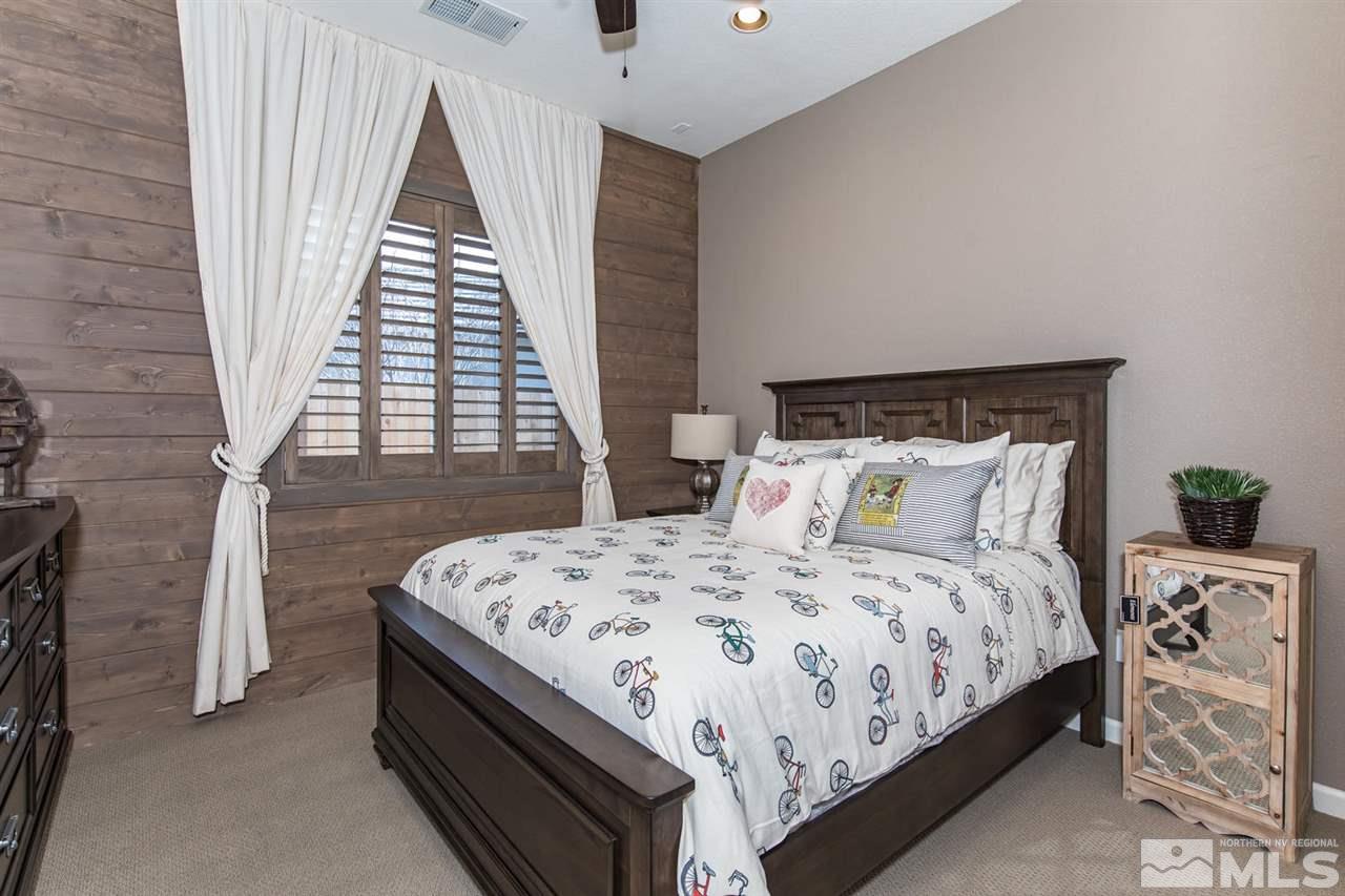 2089 Altair Lane Reno, NV 89521 - Photo 19 of 25 a bedroom with bed and wooden floor