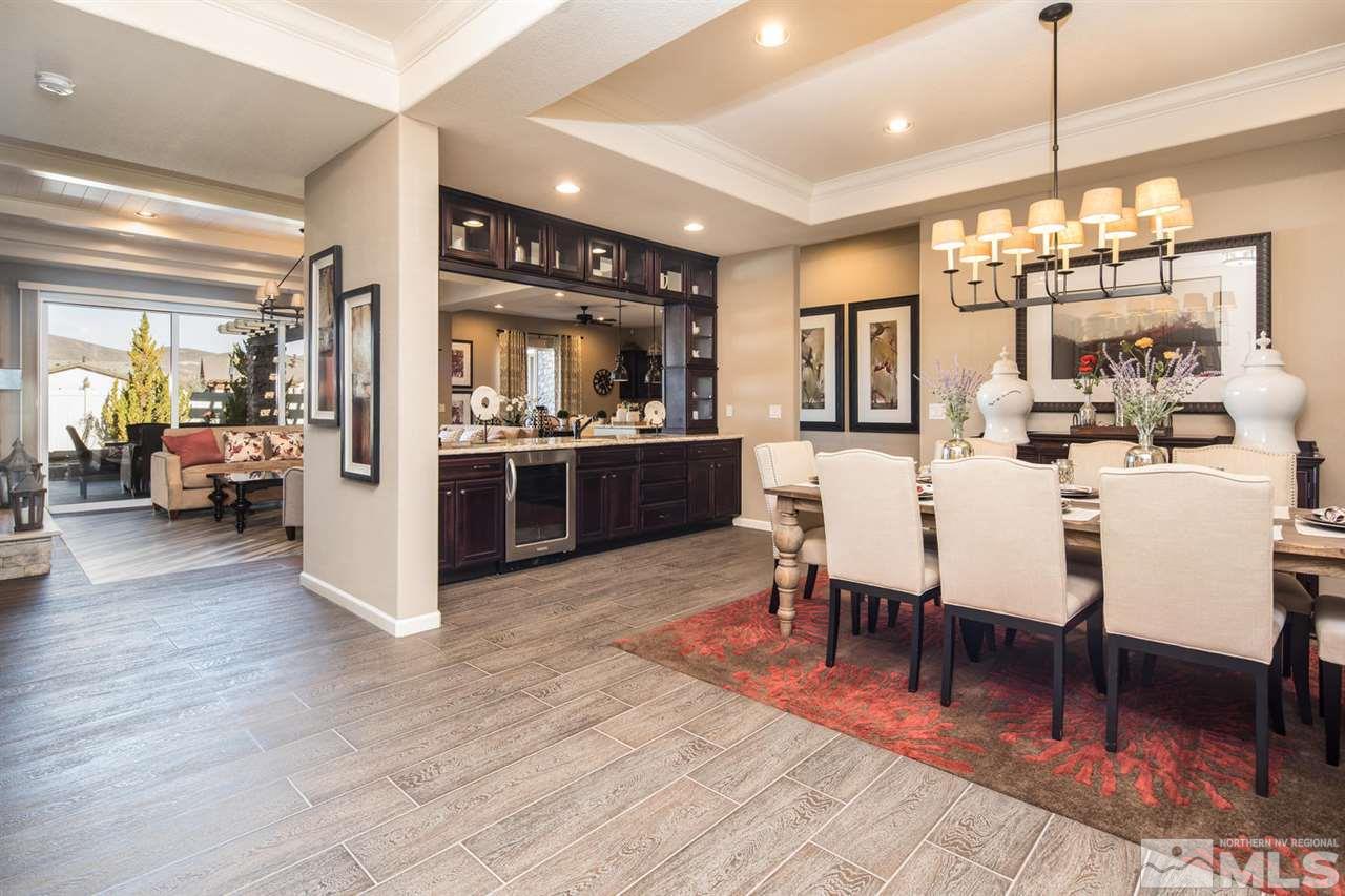 2089 Altair Lane Reno, NV 89521 - Photo 6 of 25 a view of a dining room with furniture wooden floor and chandelier