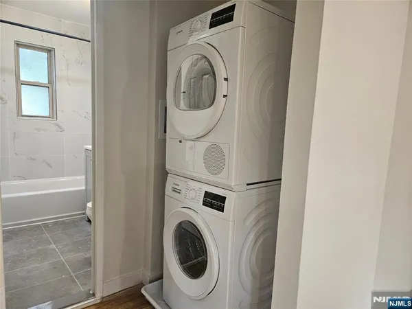 a utility room with dryer and washer