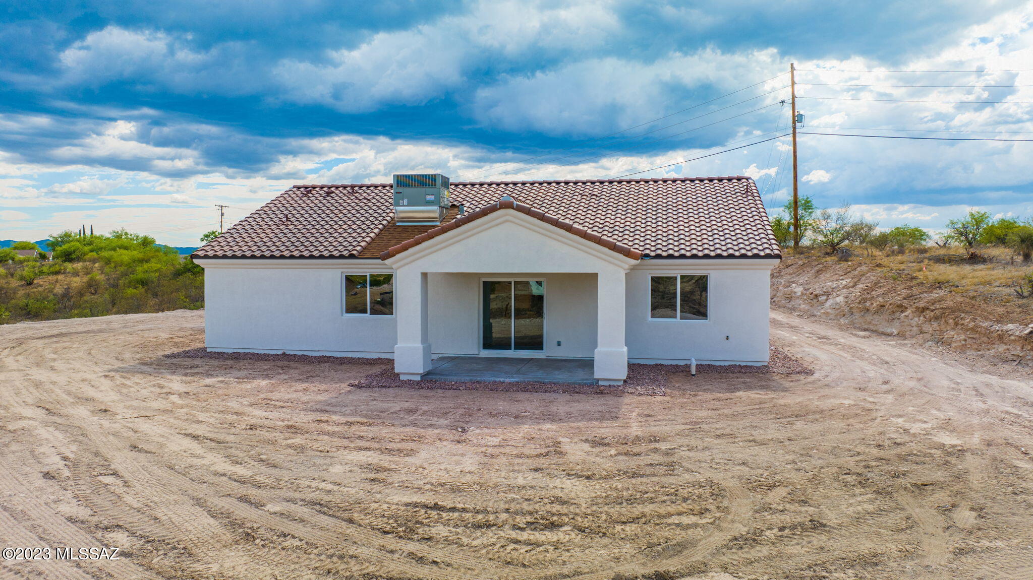 1019 Paseo Guebabi Rio Rico, AZ 85648 - Photo 6 of 25 a view of a house with a yard