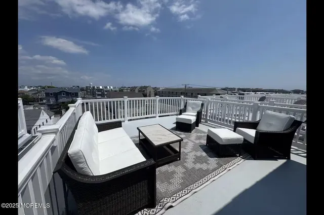 a kitchen with a stove a refrigerator and a sink