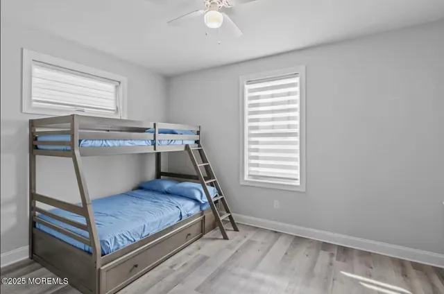 a room with a bed and a window