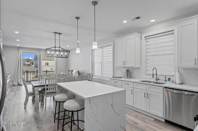 a view of a livingroom with furniture