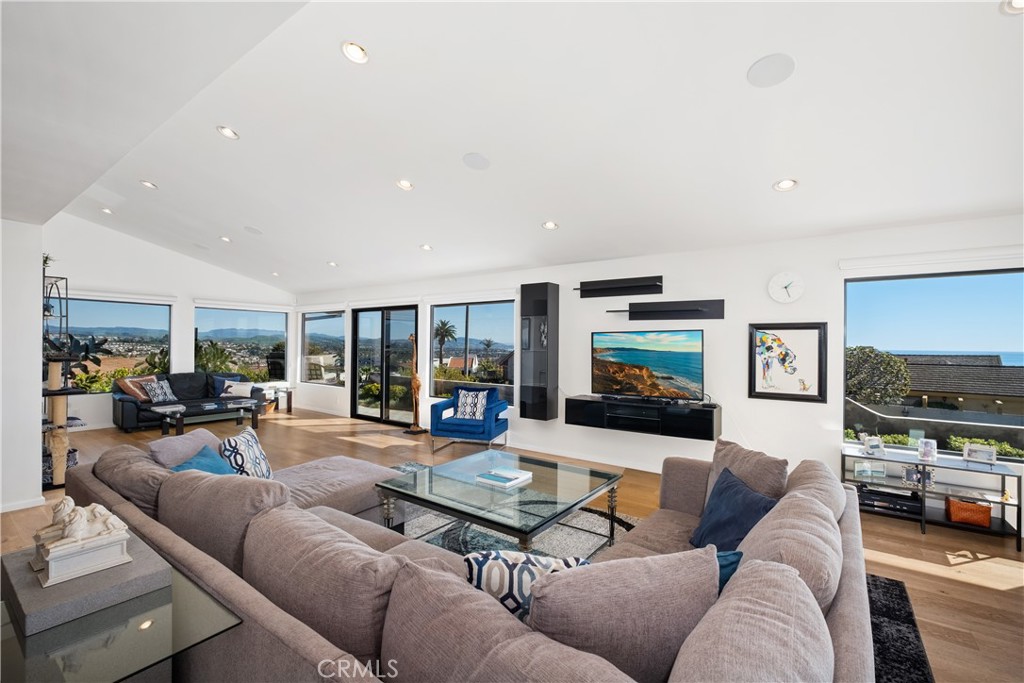 32182 Sea Island Drive Dana Point, CA 92629 - Photo 11 of 48 a living room with furniture and a flat screen tv