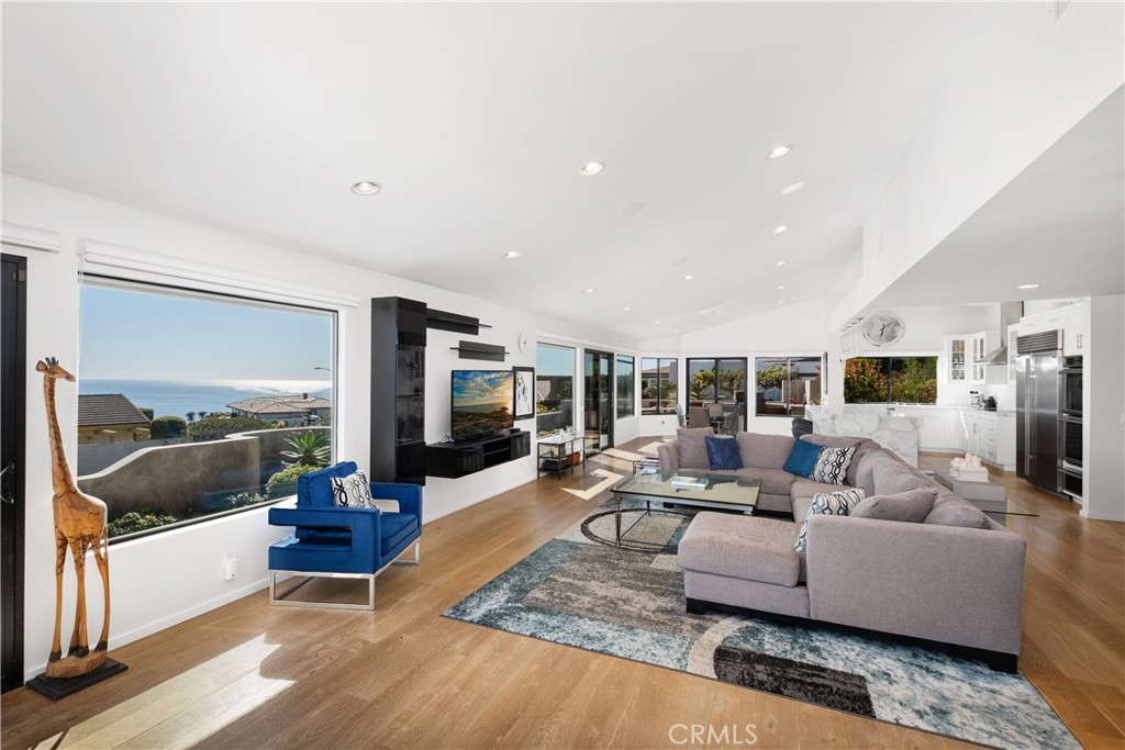 32182 Sea Island Drive Dana Point, CA 92629 - Photo 13 of 48 a living room with furniture and a large window