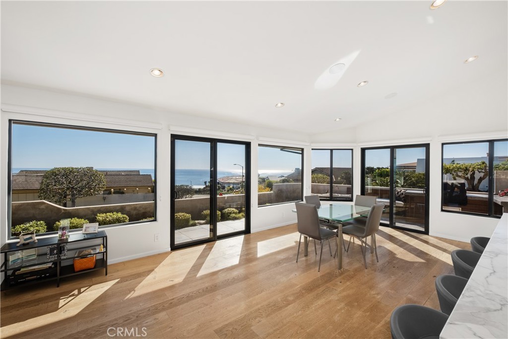 32182 Sea Island Drive Dana Point, CA 92629 - Photo 17 of 48 a view of a living room and floor to ceiling window and an outdoor view