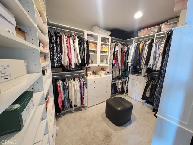 a bathroom with a shower toilet and sink