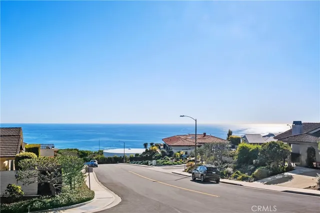 a living room with fireplace furniture and a flat screen tv